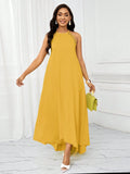 Vestido Longo Amarelo com Gola Halter – Elegância e Fluidez do P ao GG