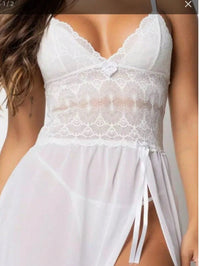 Vendedor Indicadocamisola feminina em tule com detalhes em renda, com fenda lateral