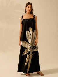 Vestido Longo Preto com Estampa de Folhas Tropicais – Elegância e Leveza Nelima Moda