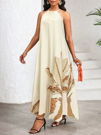 Vestido Longo Estampado Bege com Gola Halter – Elegância e Fluidez do P ao GG