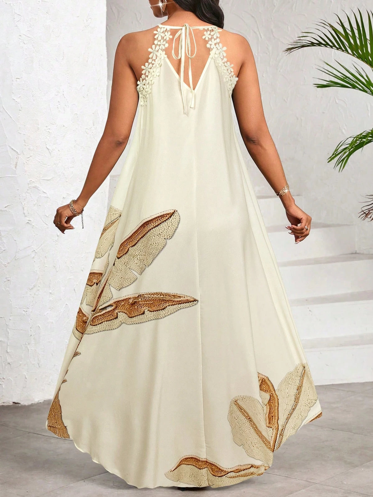 Vestido Longo Estampado Bege com Gola Halter – Elegância e Fluidez do P ao GG