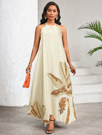 Vestido Longo Estampado Bege com Gola Halter – Elegância e Fluidez do P ao GG